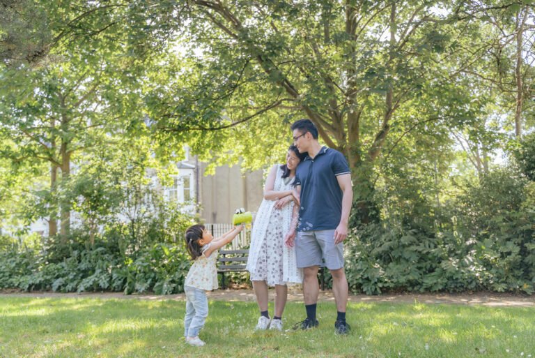 family playing in photo session London